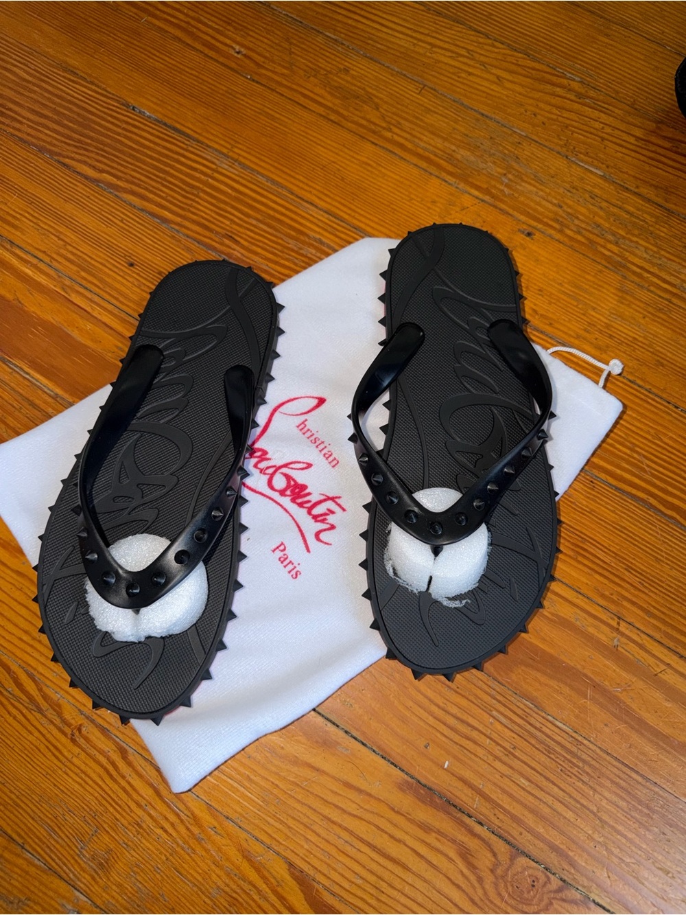 Black rubber flip flops spikey size 6 NWT